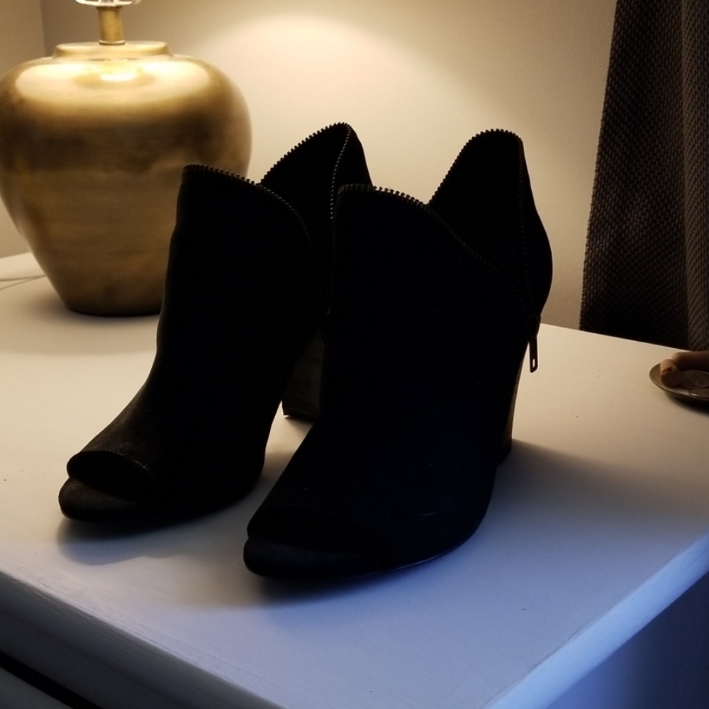 Stylish thick, high healed peekaboo toe shoes.